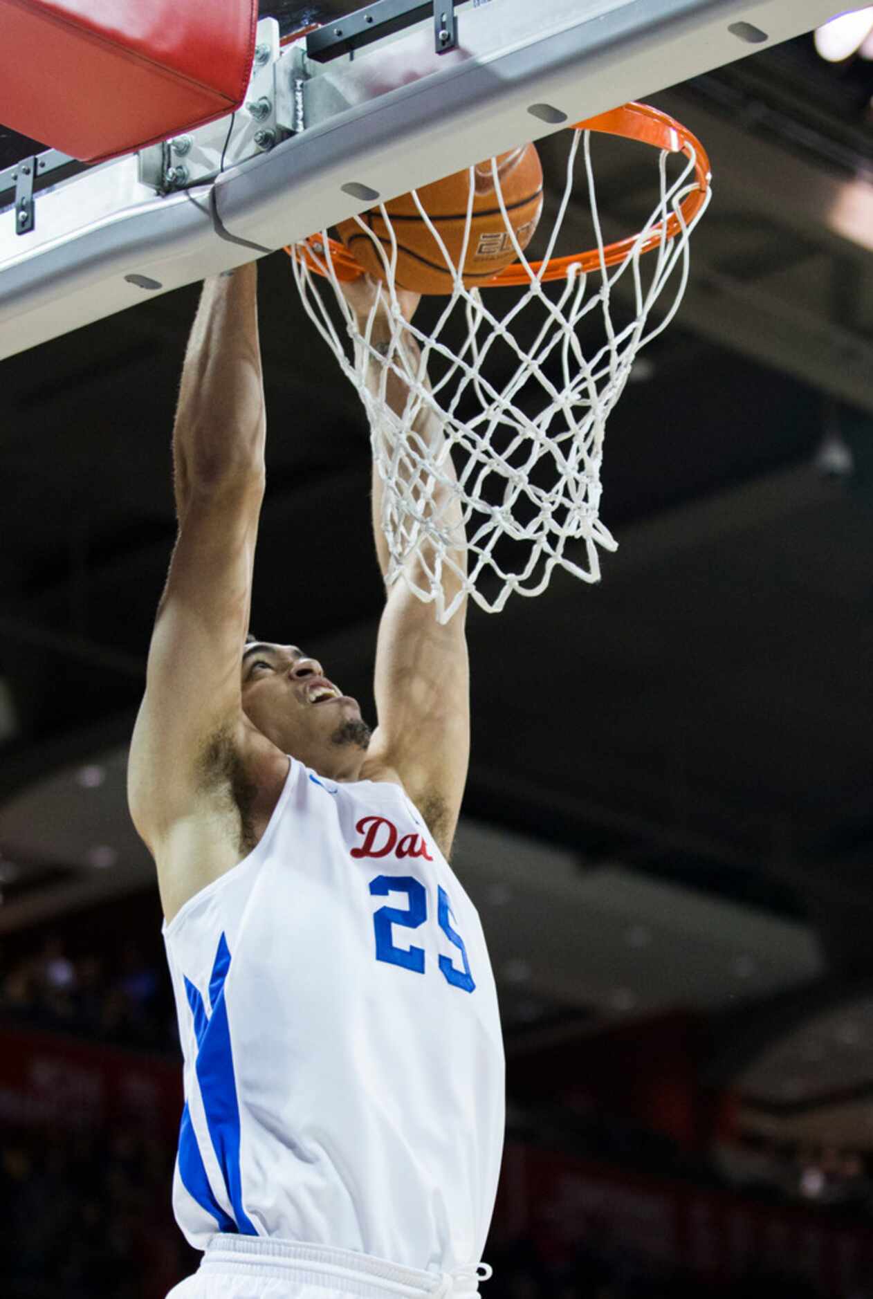 Southern Methodist Mustangs forward Ethan Chargois (25) dunks the ball during the first half...