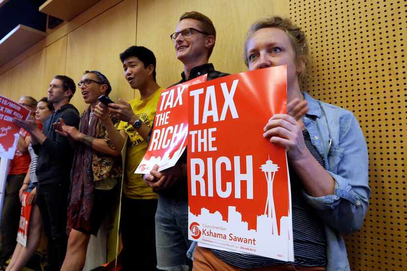 This summer, Seattle adopted an income tax on earnings over $250,000, supported by some city...