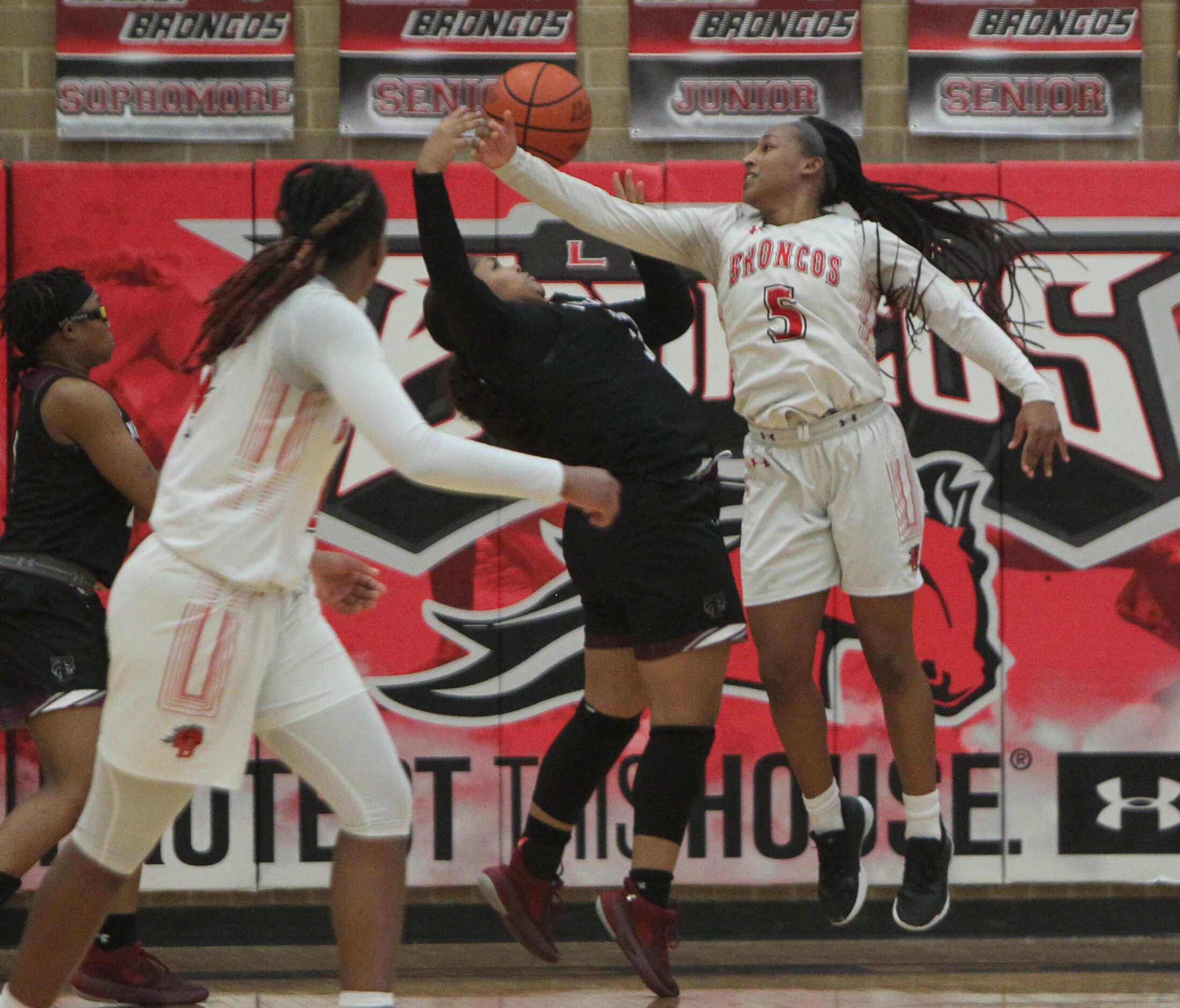 Mansfield Legacy guard Savannah Catalon (5) battles Mansfield Timberview post Trinity King...