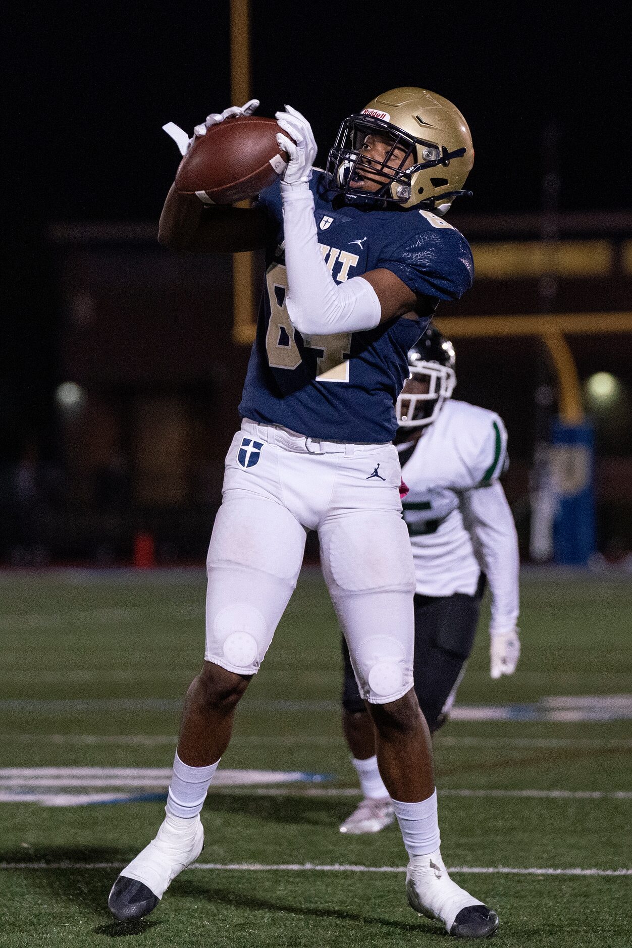 Jesuit sophomore wide receiver Landon Polk (84) makes a catch during the first half of a...