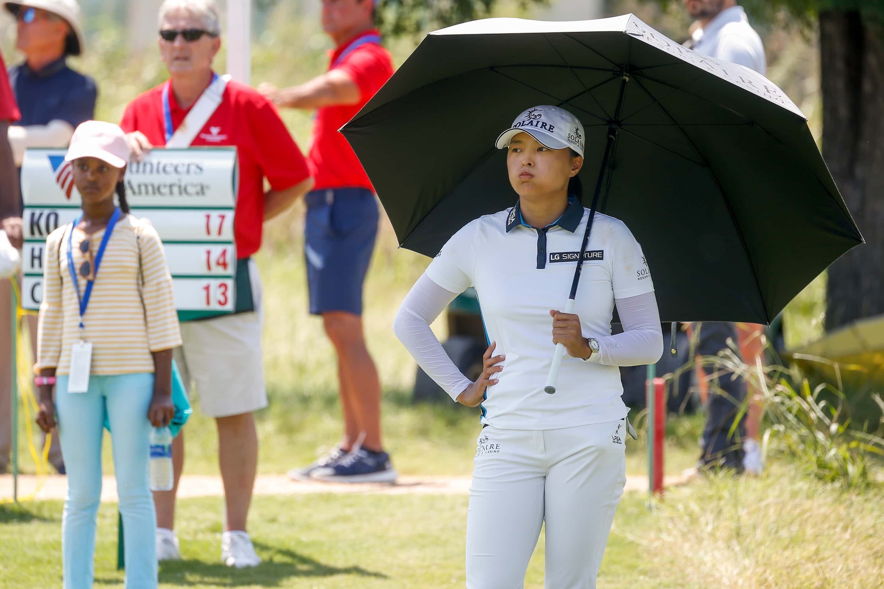 Professional golfer Jin Young Ko takes a breath as her group finishes on the No. 4 green...