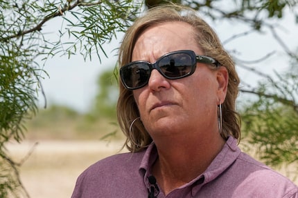 Rancher Donna Schuster looks out over her 8,000-acre ranch near Brackettville in Kinney...