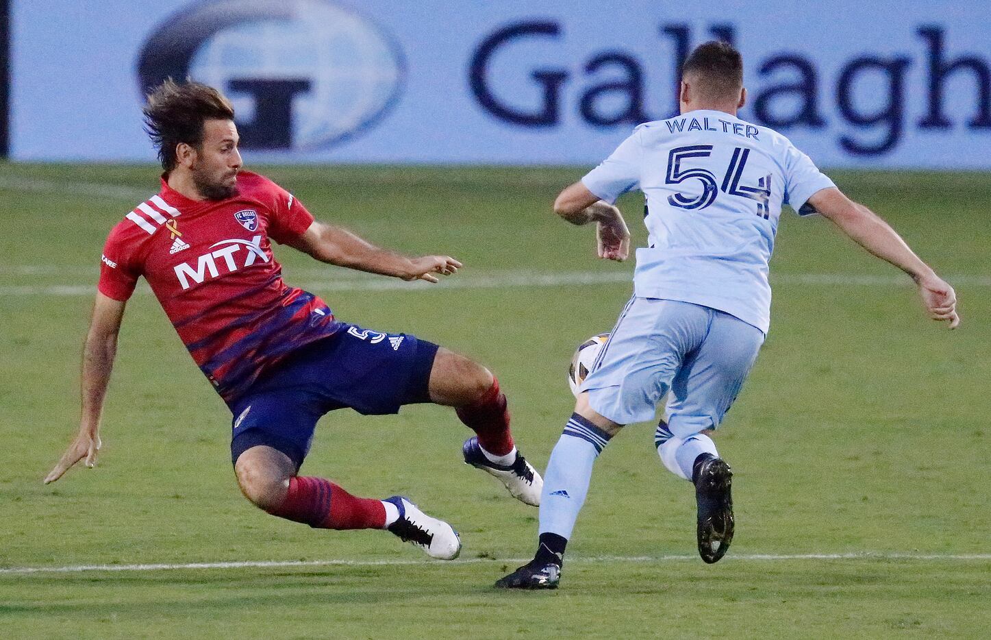 FC Dallas midfielder Facundo Quignon (5) tries to make a play on the ball before Sporting...