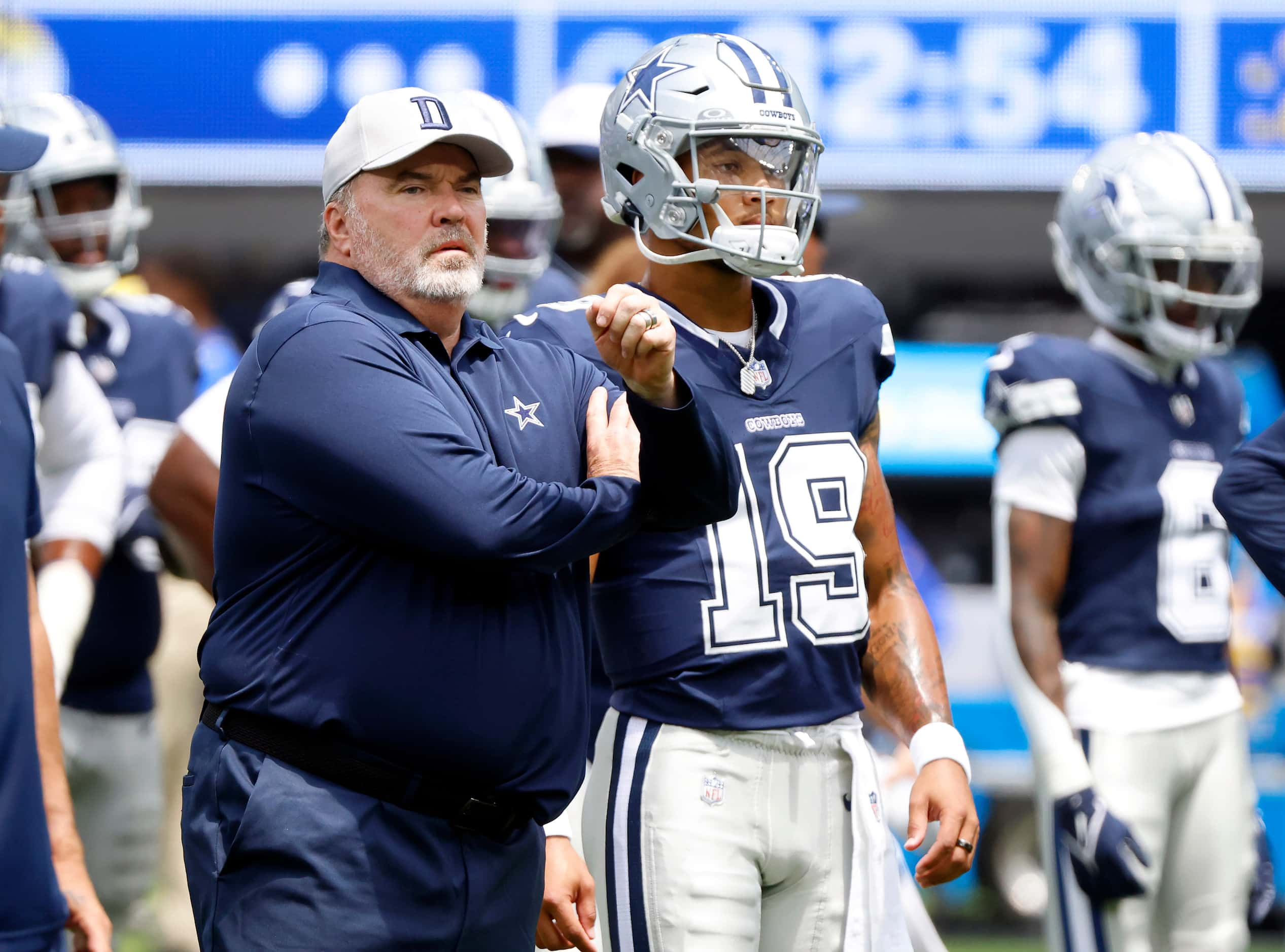 Dallas Cowboys head coach Mike McCarthy and his quarterback Trey Lance before facing the Los...