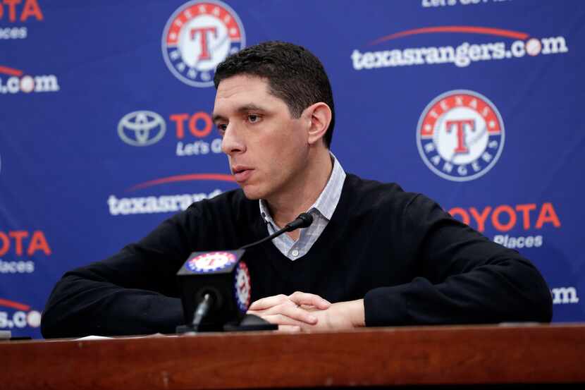 Texas Rangers general manager Jon Daniels addresses questions from reporters during a news...