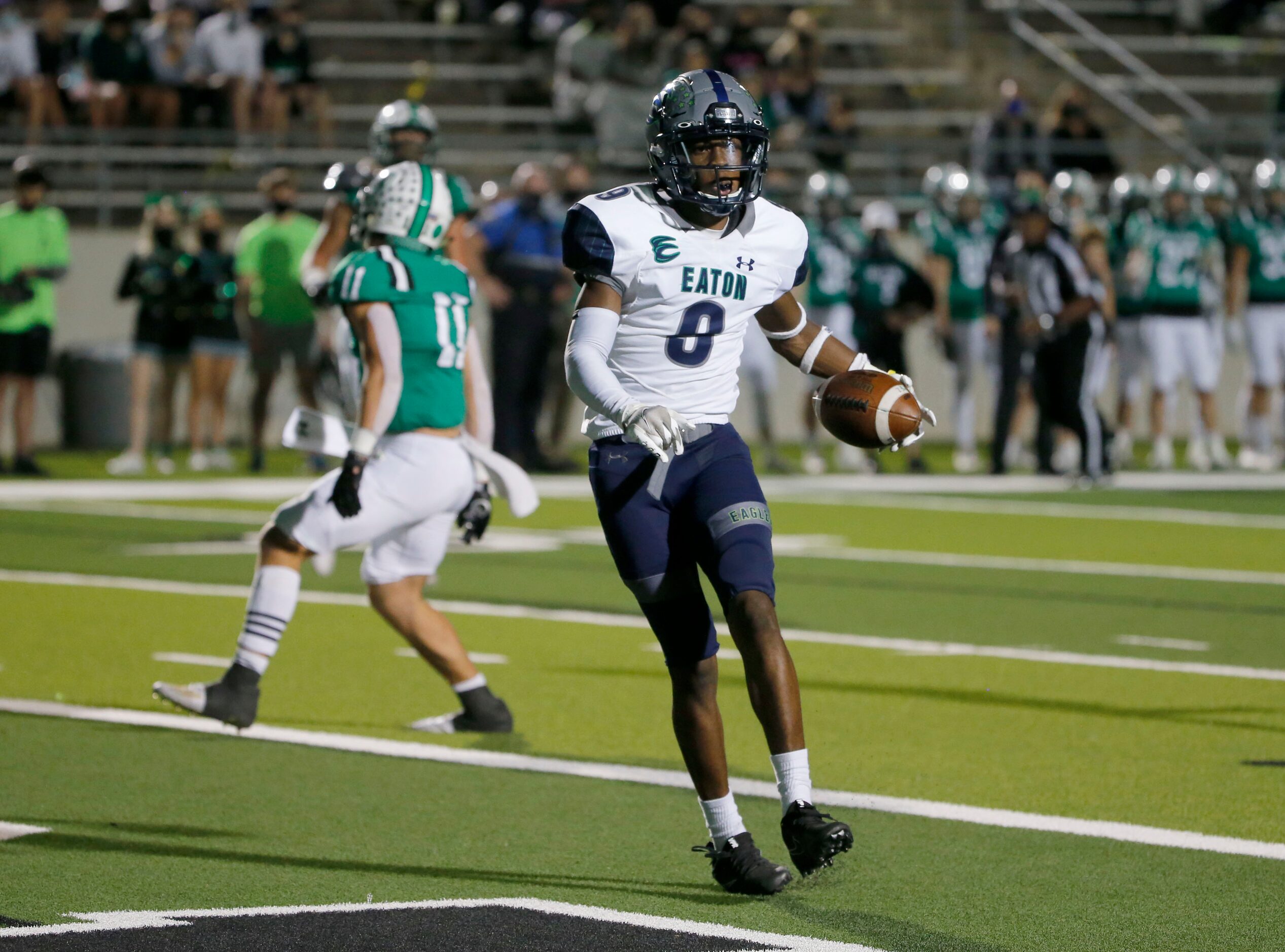 Eaton receiver Royal Evans (9) scores a touchdown against Southlake during their high school...