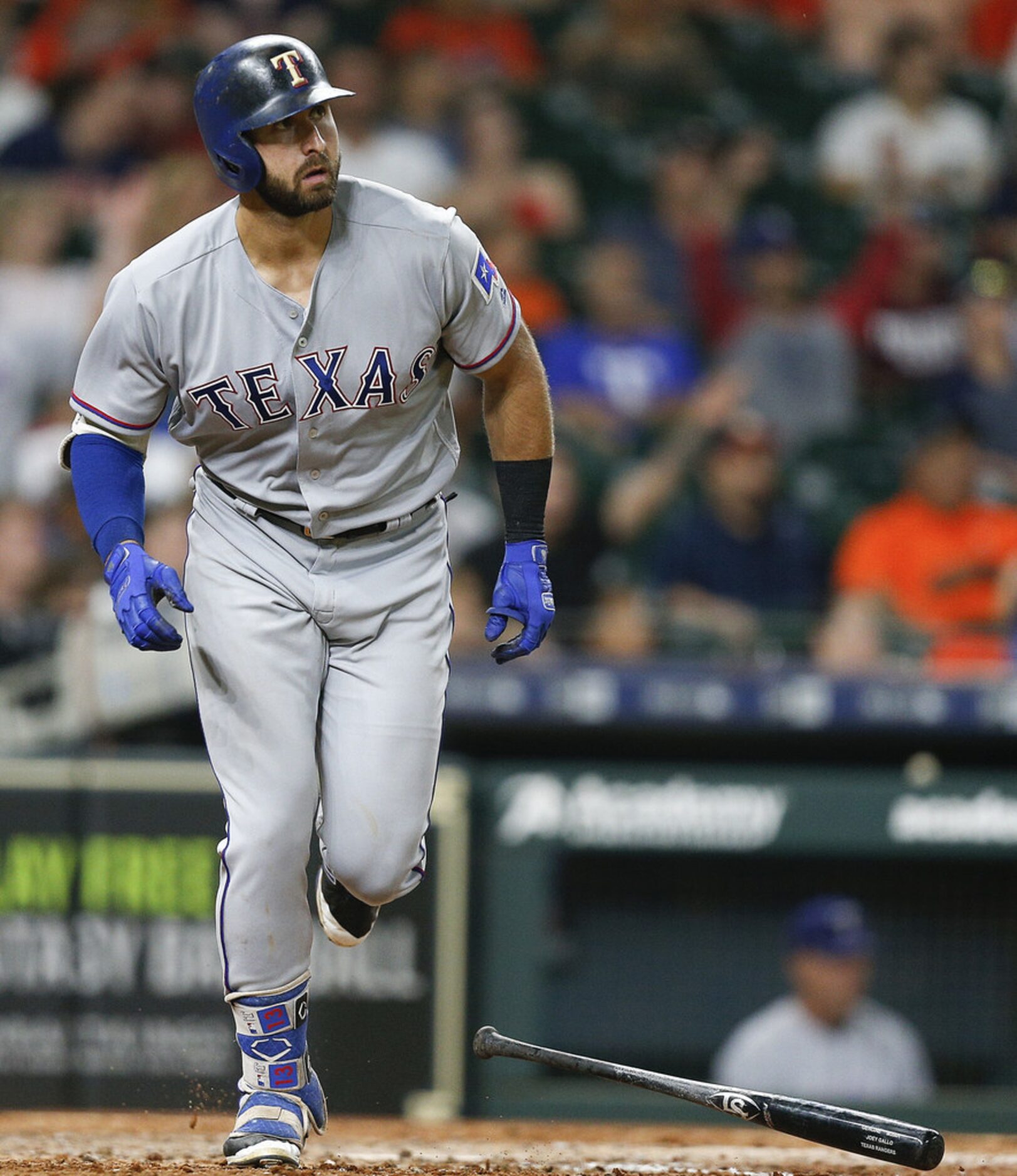 HOUSTON, TX - JULY 28:  Joey Gallo #13 of the Texas Rangers hits a three-run home run in the...