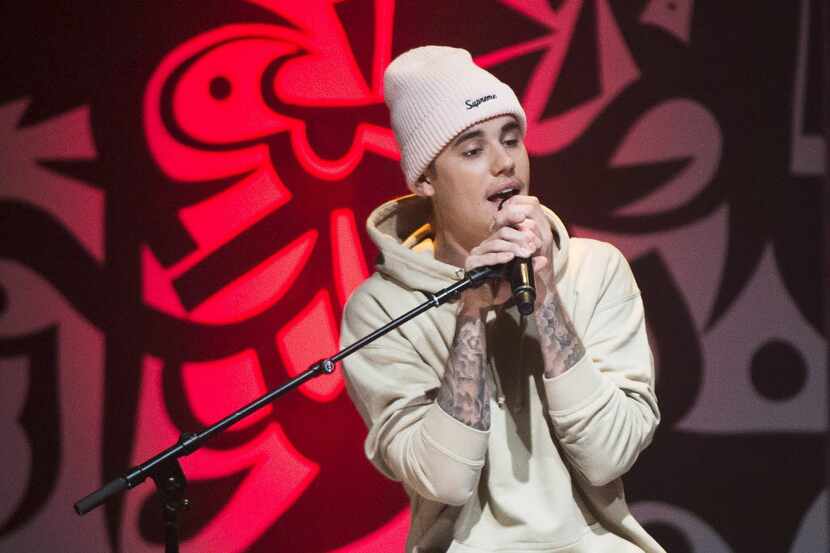 FILE - In this Monday, Dec. 7, 2015 file photo, Canadian singer Justin Bieber performs live...