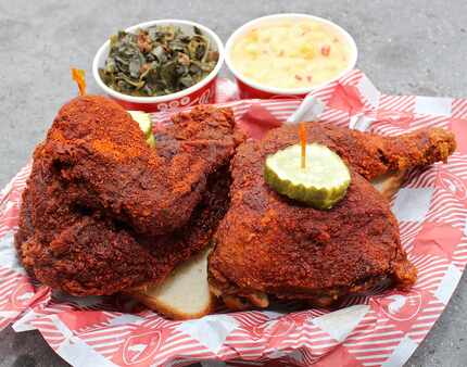 Hattie B's 1/2 bird plate (breast, thigh, leg & wing — hot heat level) is served here with...