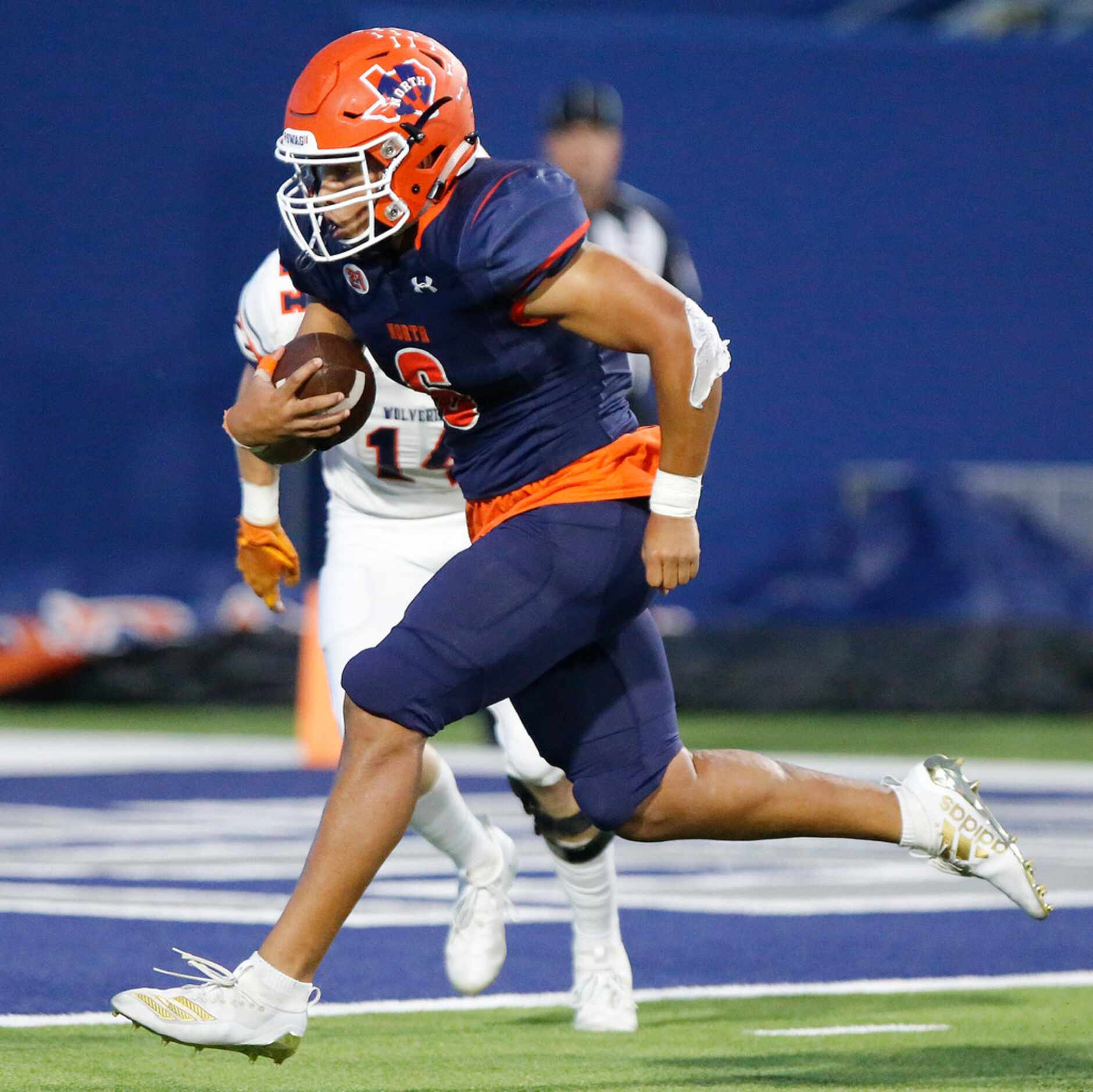McKinney North High School running back Emmanuel Fincher (6) steps into the end zone during...
