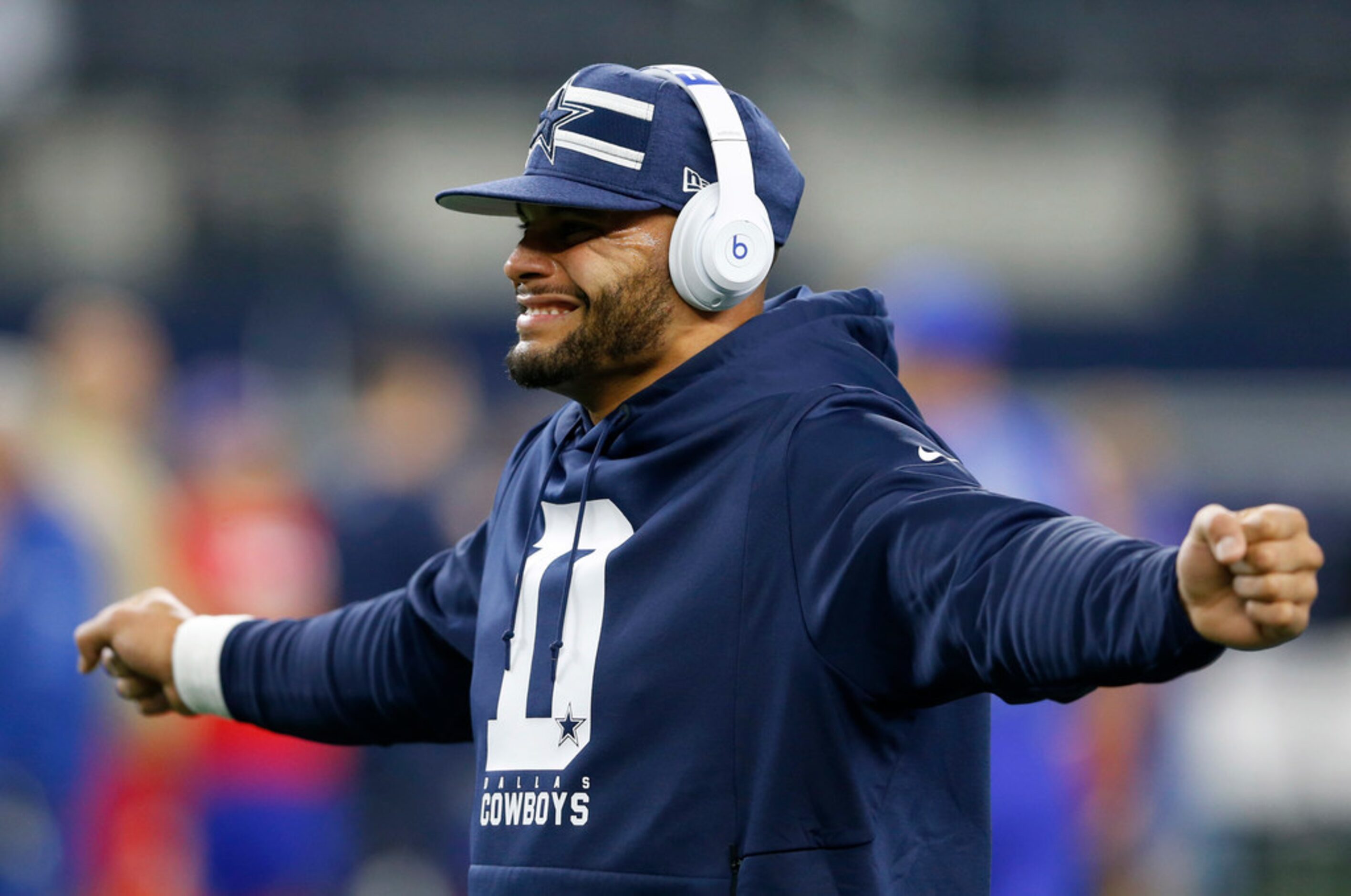 Dallas Cowboys quarterback Dak Prescott (4) stretches before a game against the Buffalo...