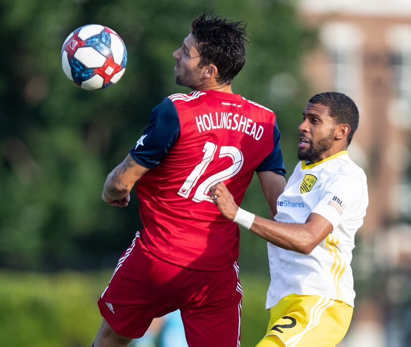 DALLAS, TX - JUNE 19: Ryan Hollingshead goes up for a header during the Lamar Hunt U.S. Open...