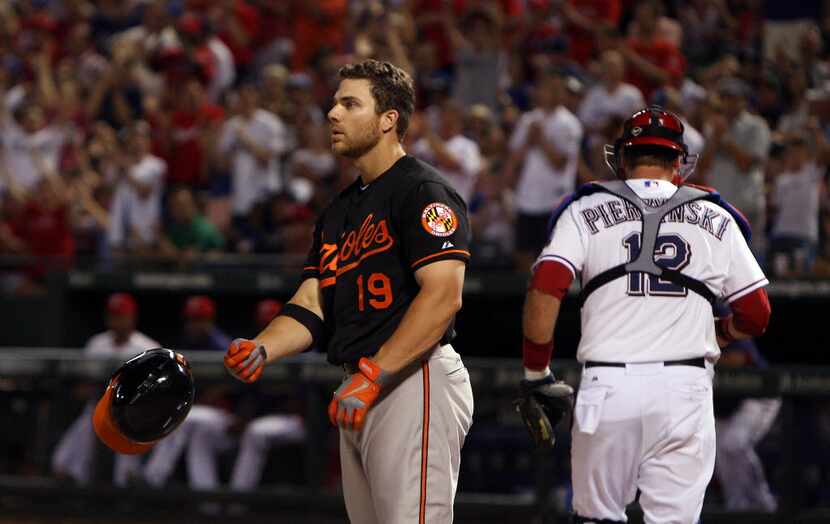 Baltimore Orioles first baseman Chris Davis (19) strikes out to end the ninth inning off...