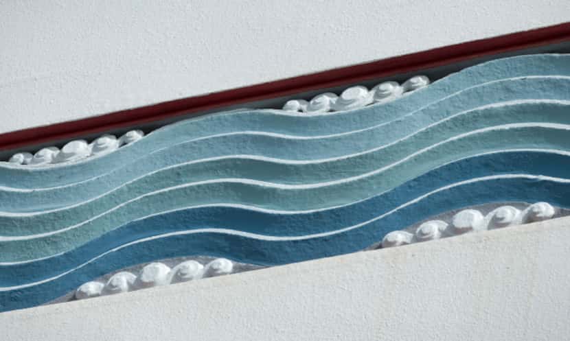 Tell-tale art deco wave motif on a building in Napier, New Zealand.