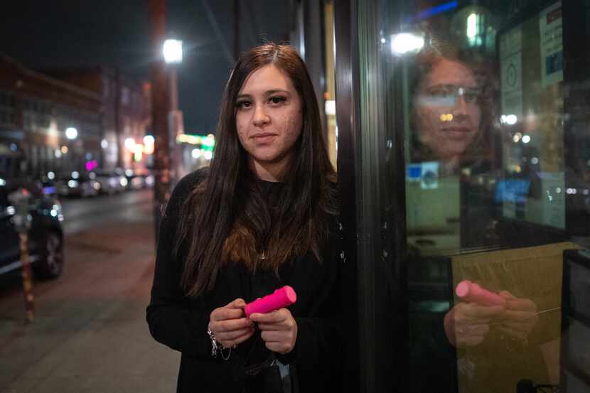 Restaurant manager Seryna Fagan, 18, poses with a canister of pepper spay she carries for...