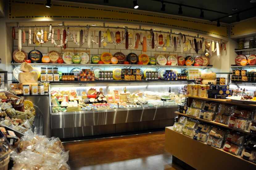 At Eatzi's, customers can find high-end cheese and wine, a small produce section, and...