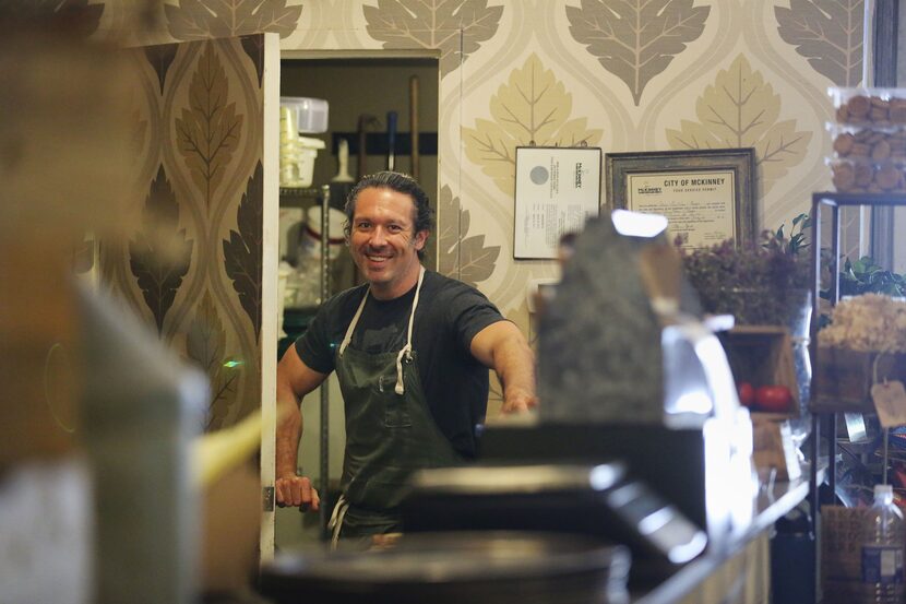 Chef Robert Lyford stands for a portrait after preparing cheddar biscuits at Patina Green...