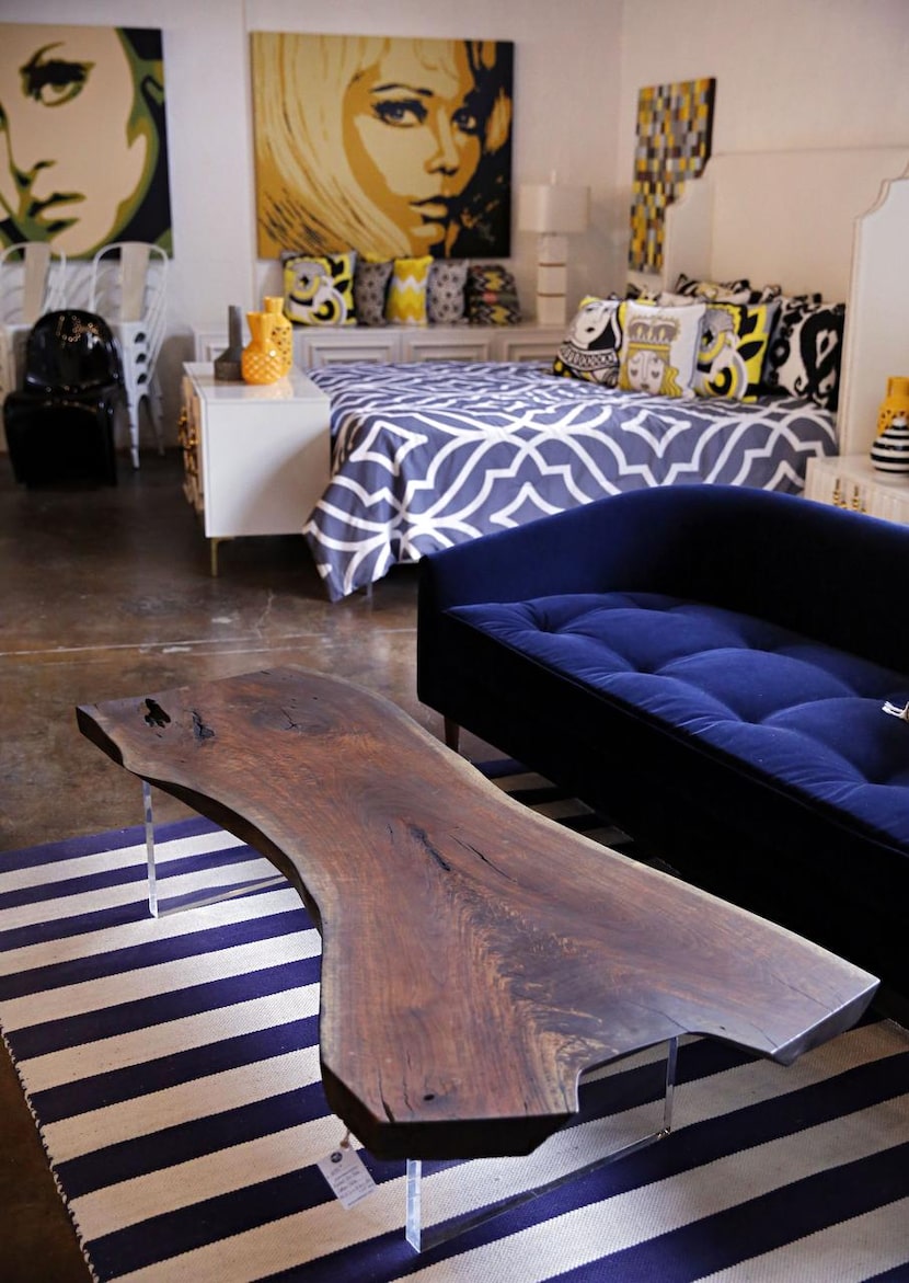 A walnut cocktail coffee table  is among the furniture sold at ModShop, an outpost of the...