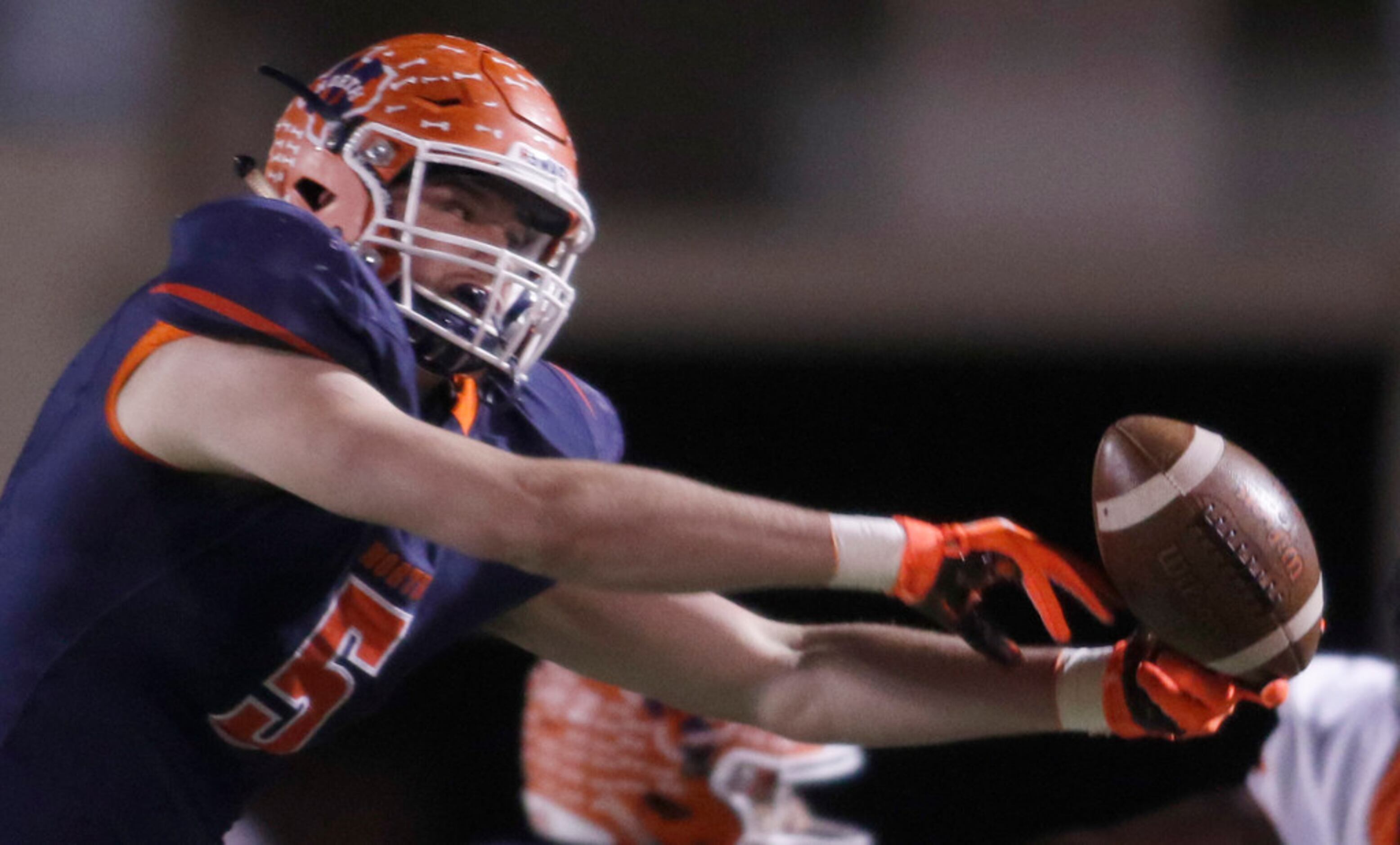 McKinney North tight end Brandon Frazier (5) reaches to pull in a pass during first quarter...