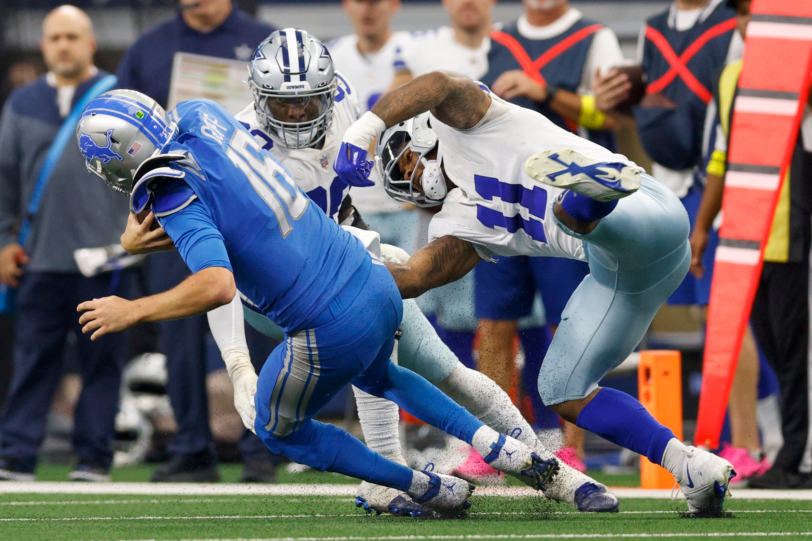 Dallas Cowboys linebacker Micah Parsons (11) sacks Detroit Lions quarterback Jared Goff (16)...