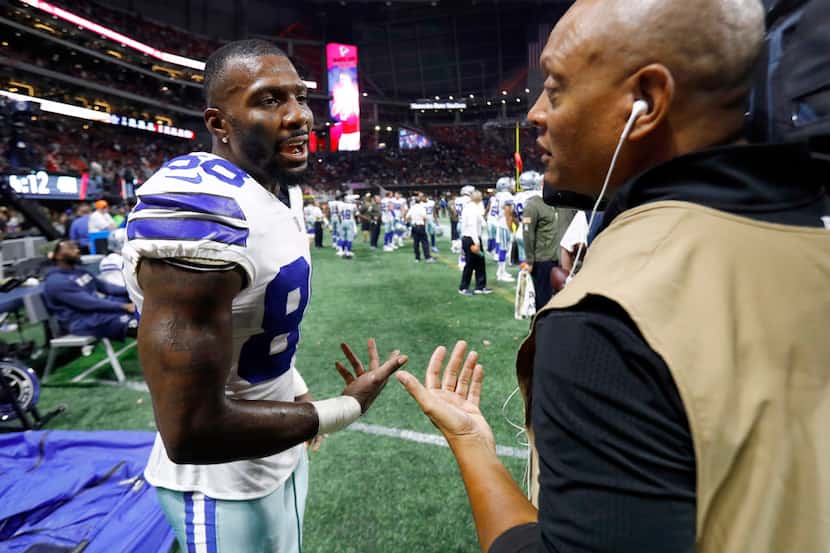 Dallas Cowboys wide receiver Dez Bryant (88) pleads with a Dallas television photographer to...