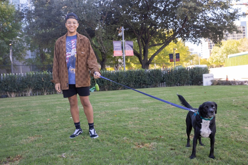 Christopher Barnette, wearing a shirt with the American flag and bald eagle, poses for a...