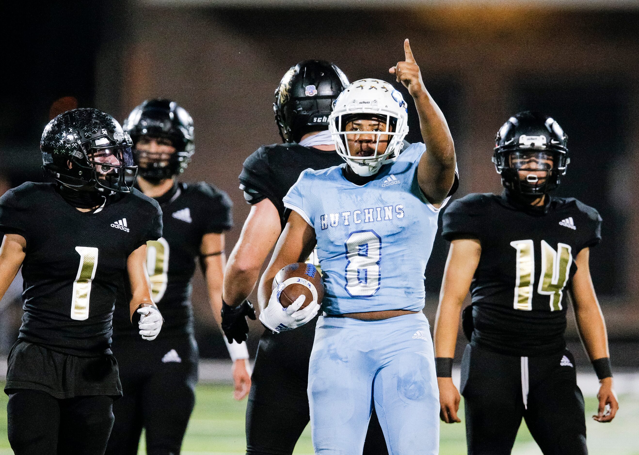 Wilmer-Hutchins senior running back Nathaniel Wright (8) celebrates a first down during the...