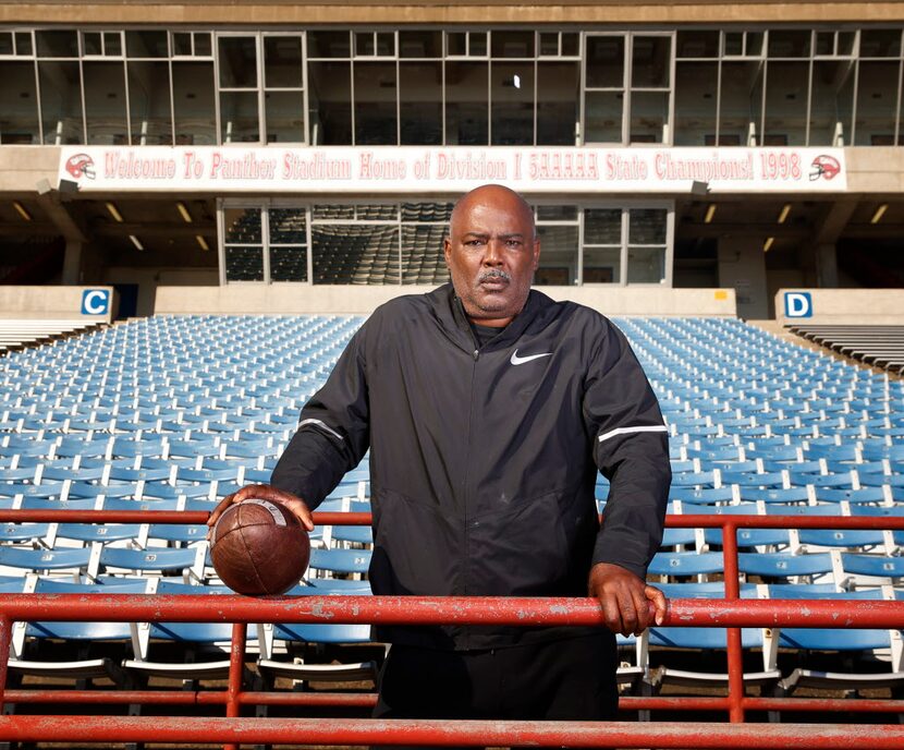 Reginald Samples, head coach of Duncanville, High School, poses for a portrait at the school...