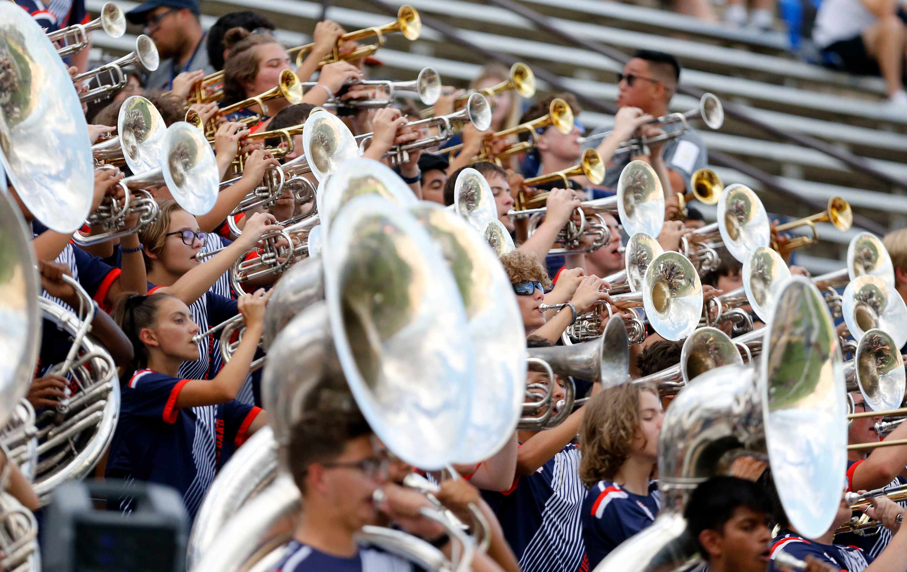 The Sachse band plays before the first half of a high school football game against the...