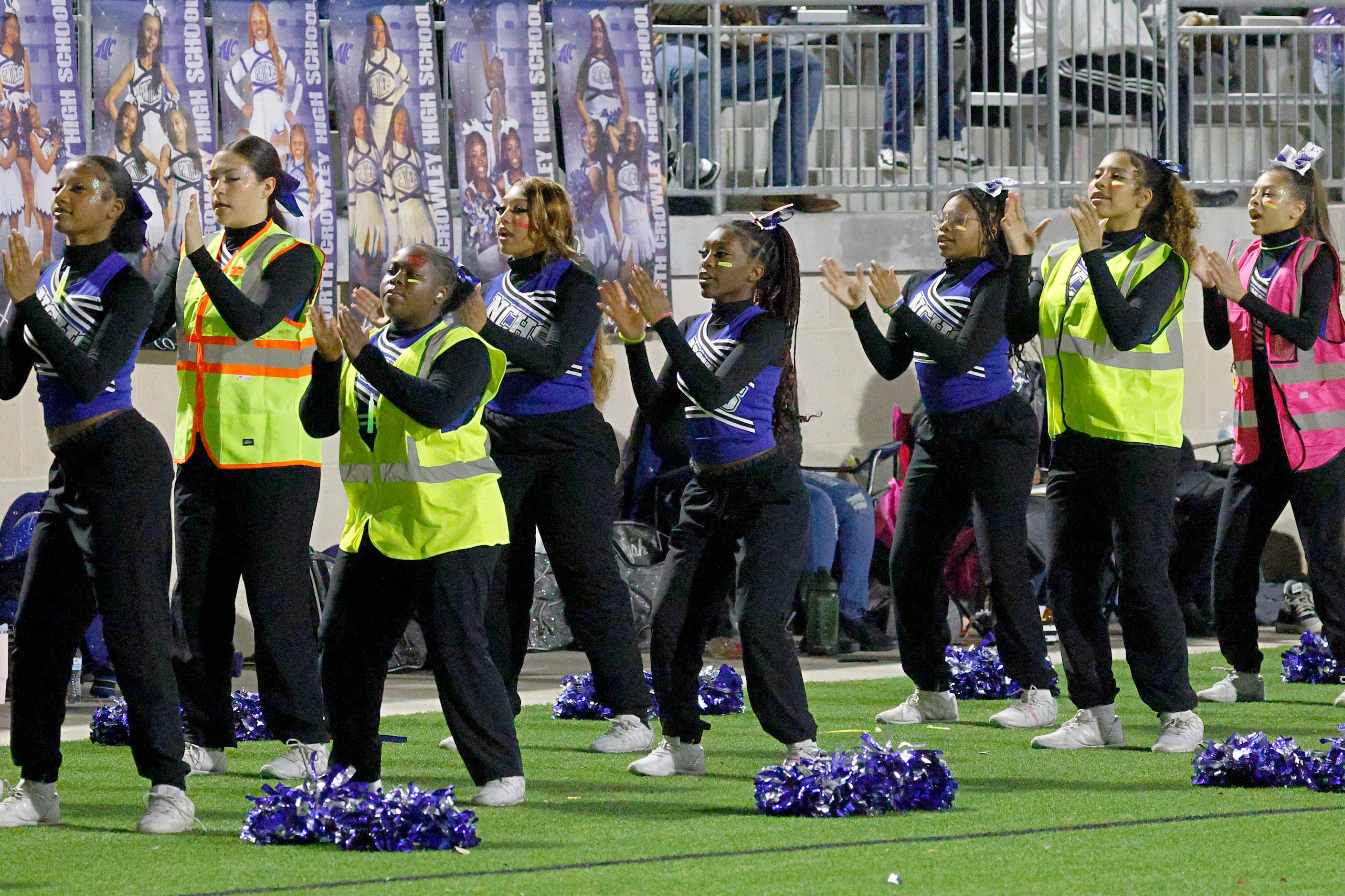 North Crowley’s cheerleaders perform in the second half of a high school football game...