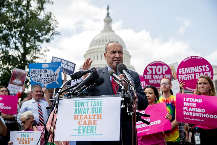 Senate Minority Leader Sen. Chuck Schumer of New York speaks to health care advocates at a...