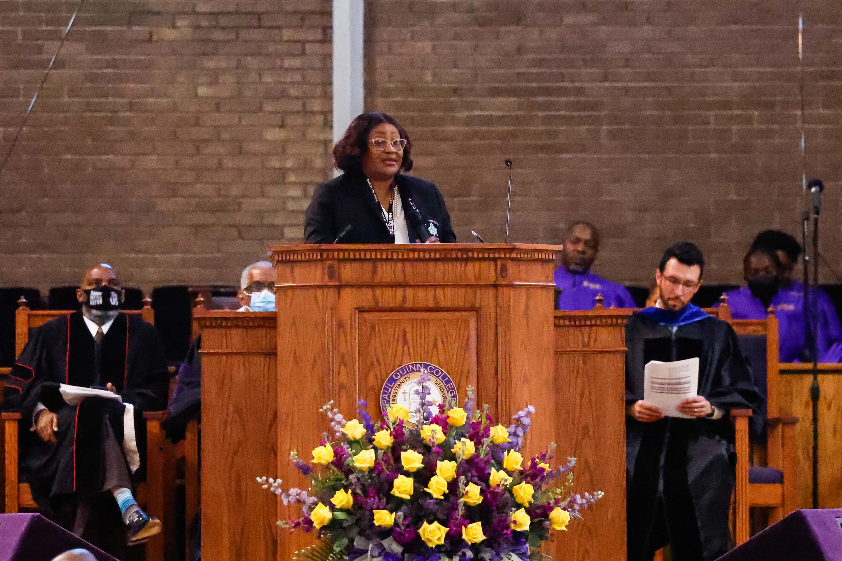 '74 alumni Trustee Dr. Bess Dunner adresses attendees during the Paul Quinn College...