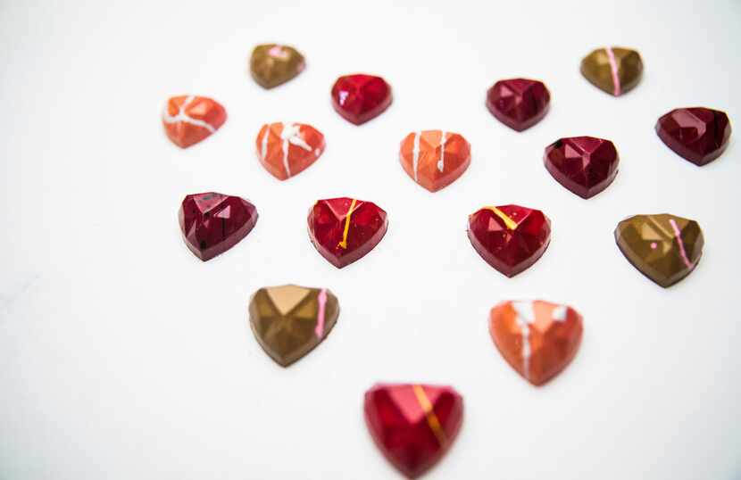 Kate Weiser is selling chocolate hearts shaped like diamonds.