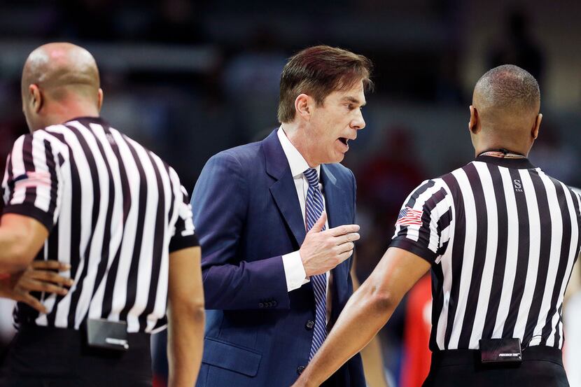 SMU head coach Tim Jankovich argues a call to a referee during the second half of a mens...