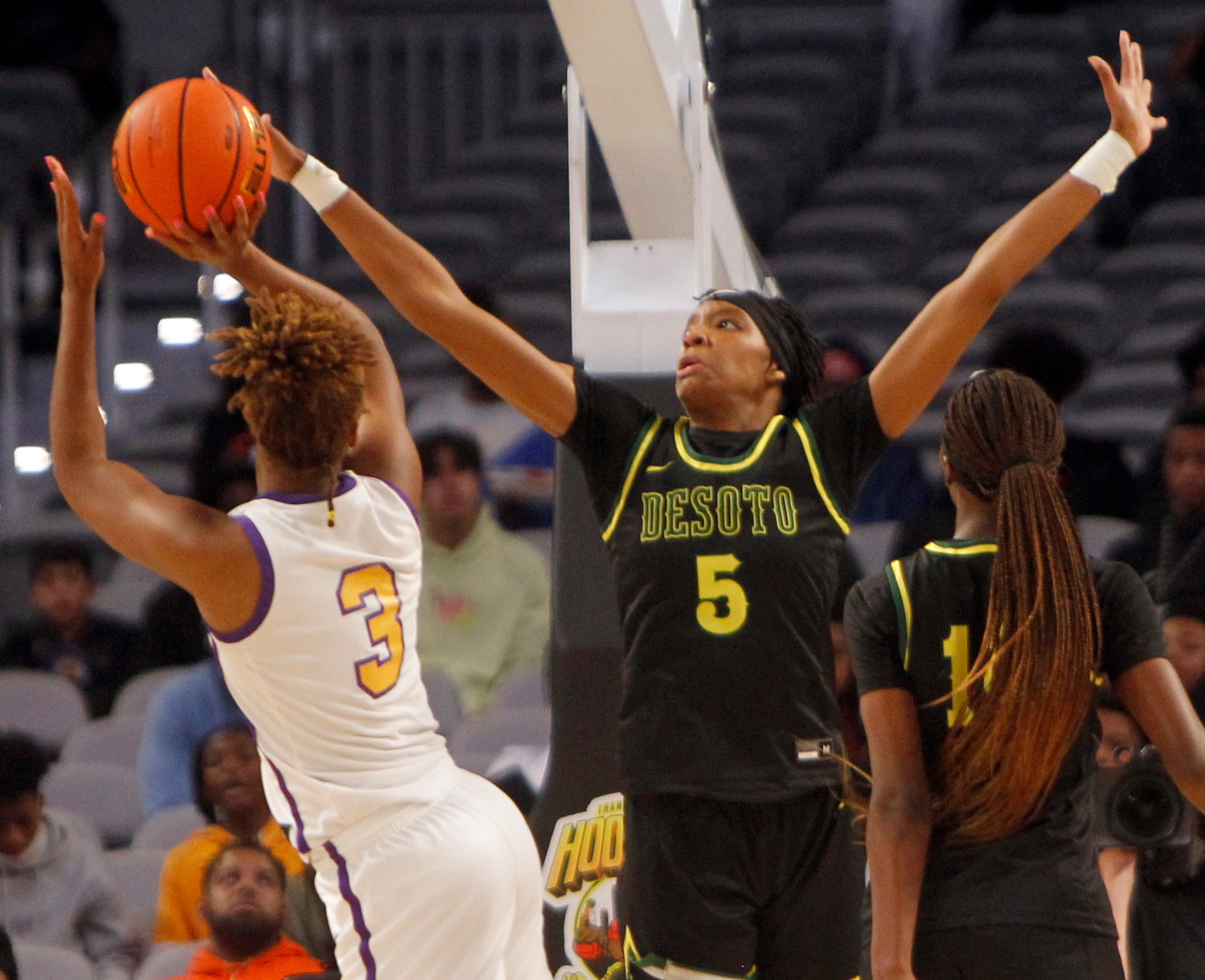 DeSoto senior Sa' Myah  Smith (5) defends a shot by Montverde forward Janiah Barker (3)...