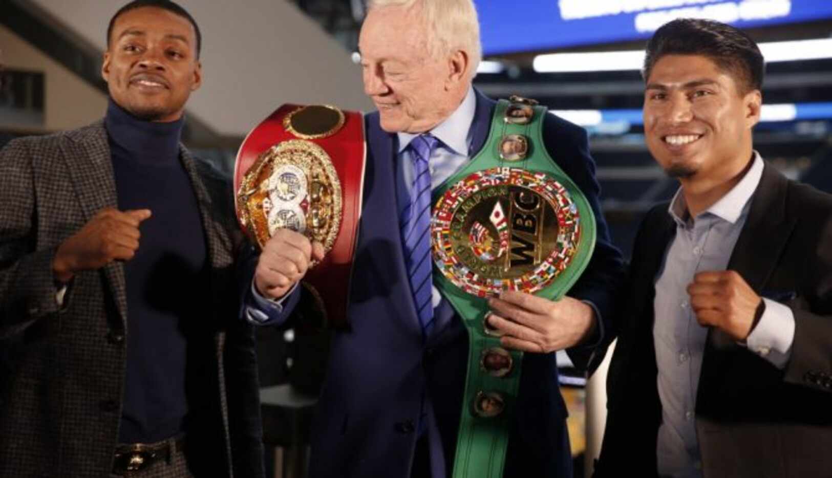 
				Boxers Errol Spence Jr. (left) and Mikey Garcia adorn Dallas Cowboys owner Jerry Jones...