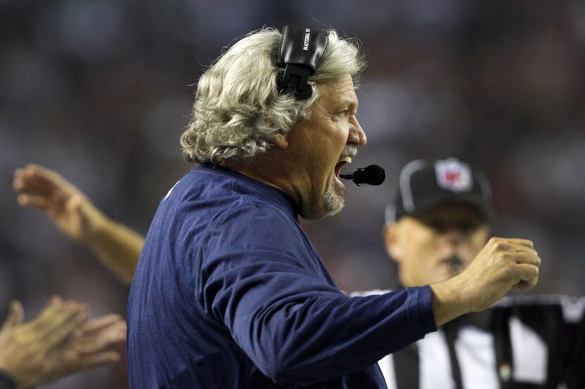 Dallas Cowboys defnesive coordinator Rob Ryan yells at his squad after one of theme got a...