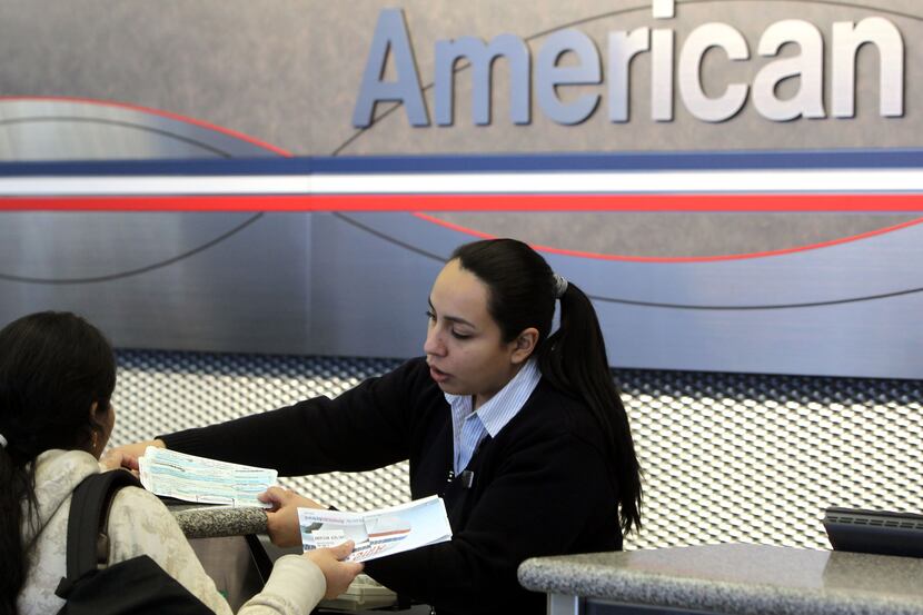 A ticket agent at the American Airlines terminal at O'Hare International Airport in Chicago...