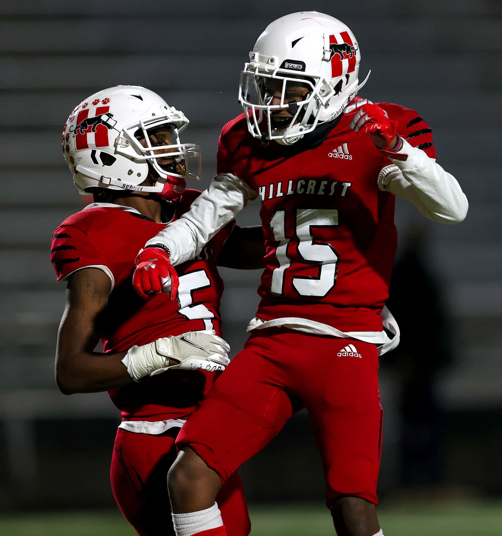 Hillcrest wide receiver Shannon Cruse (5) and wide receiver Donald Olusegun (15) celebrate...