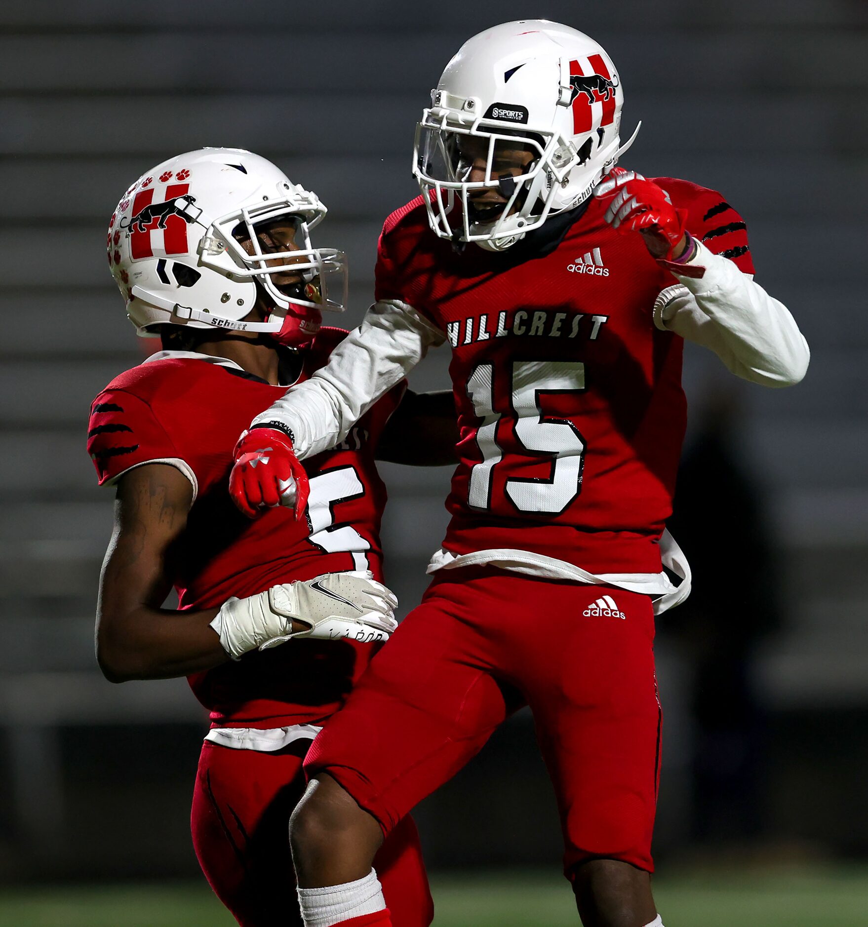 Hillcrest wide receiver Shannon Cruse (5) and wide receiver Donald Olusegun (15) celebrate...