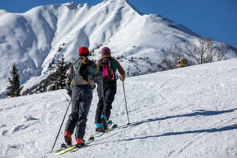 Aspen Skiing Co. has created designated uphill trails at the four mountains that make up its...