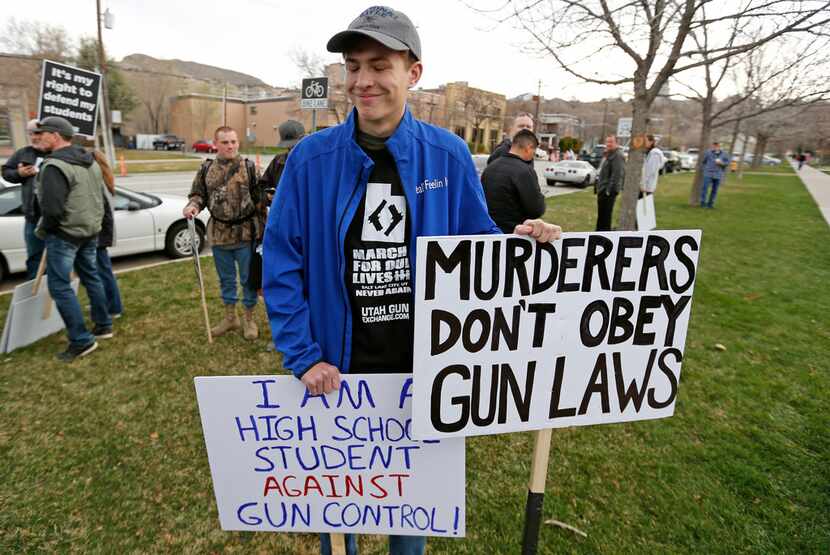 Levi Rodas, 16, from Orem High School, was among those demonstrating against stronger gun...