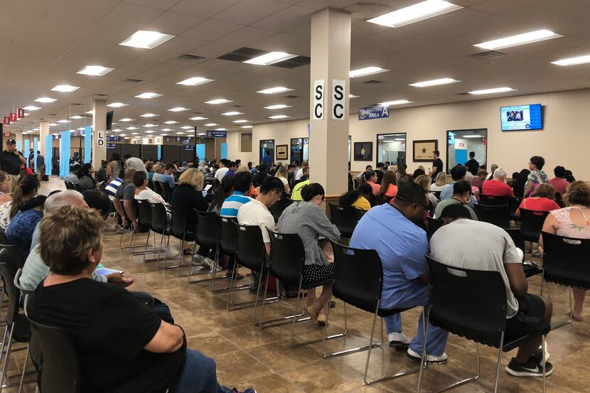 Long lines form at the Texas Department of Public Safety driver license mega center in...