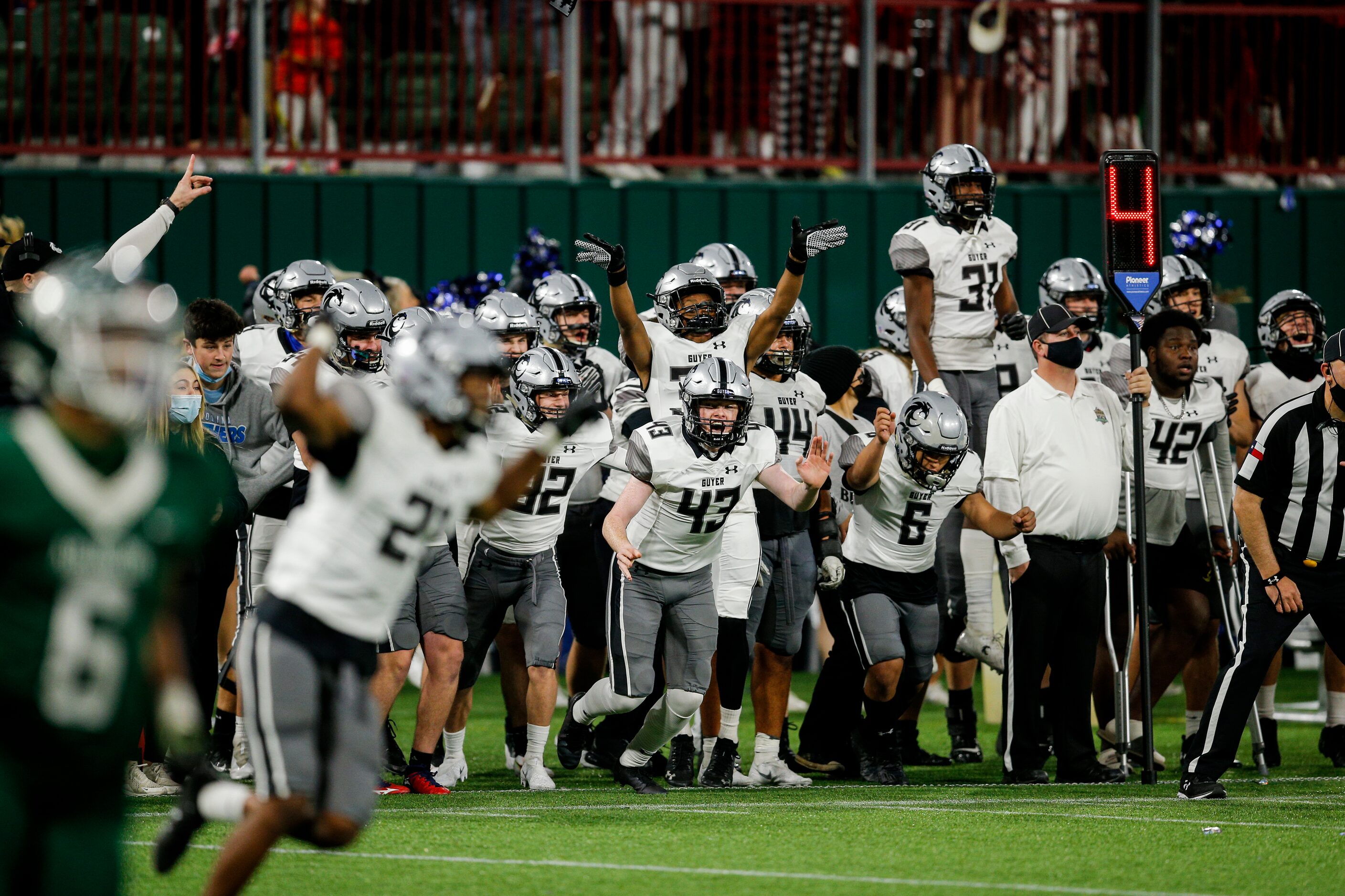 Denton Guyer celebrates a 38-31 double overtime win against Arlington after a high school...