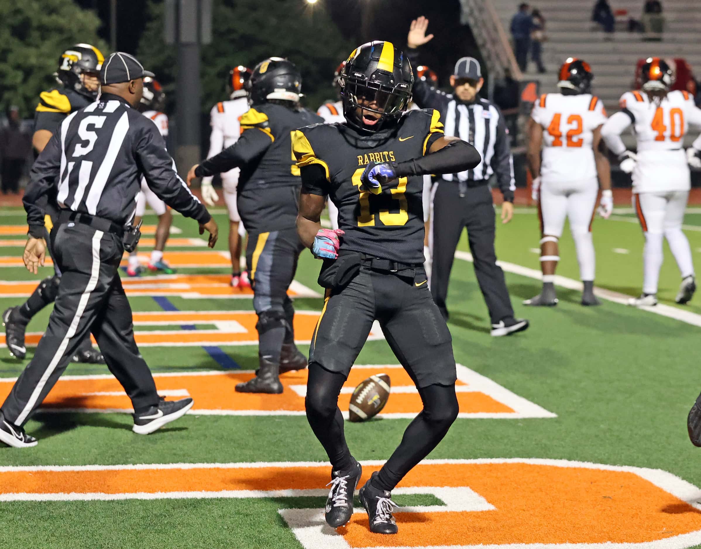 Forney high Imari Jehiel (13) dances in the end zone, after making a touchdown catch during...