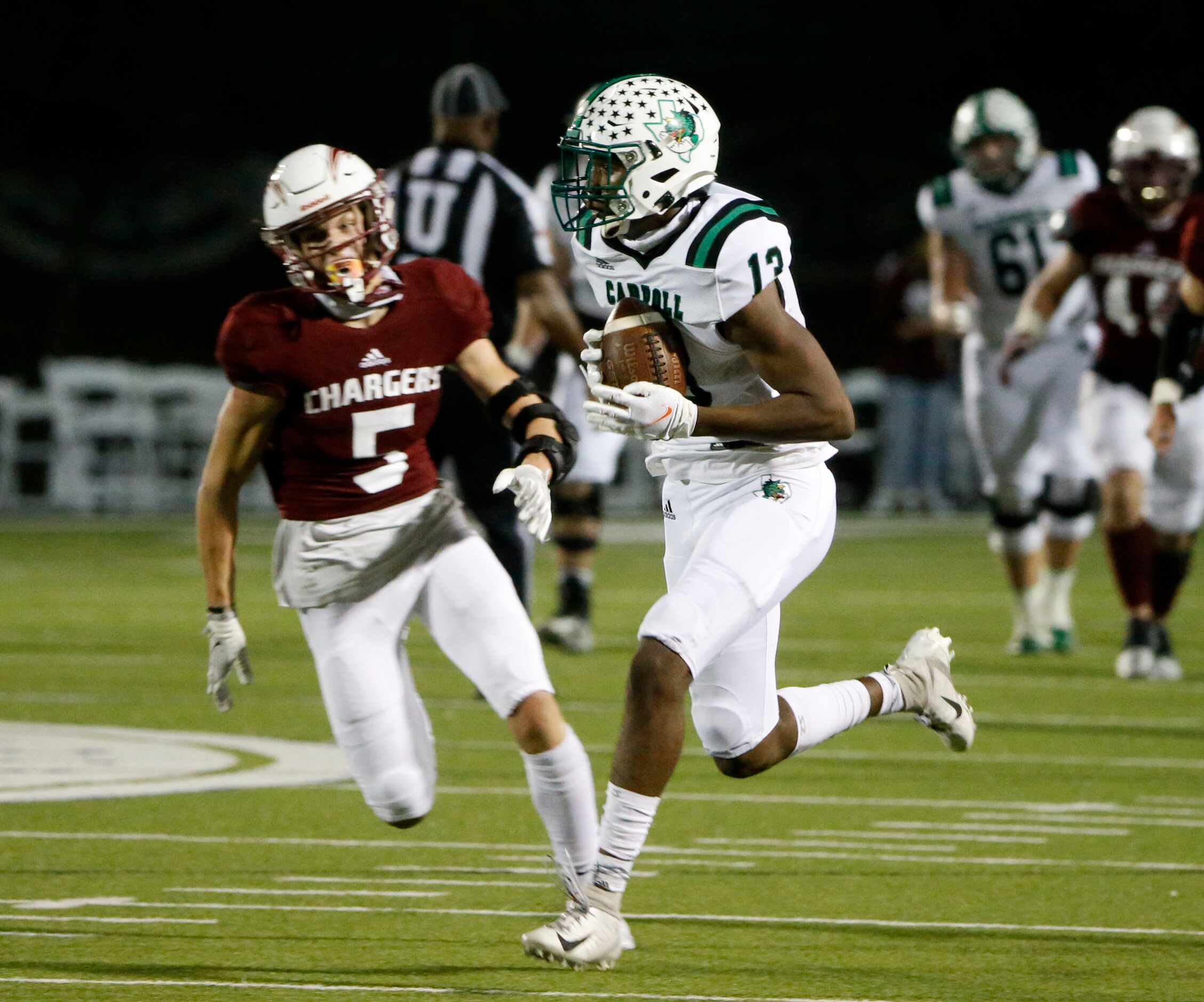 Southlake receiver RJ Maryland (13) catches a pass for a touchdown in front of Keller...