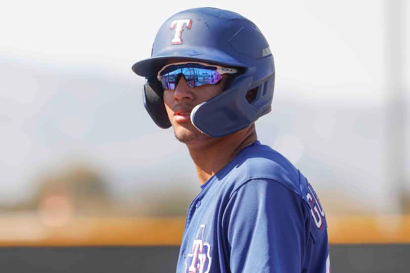 Texas Rangers minor league outfielder Anthony Gutierrez waits for a batting practice during...