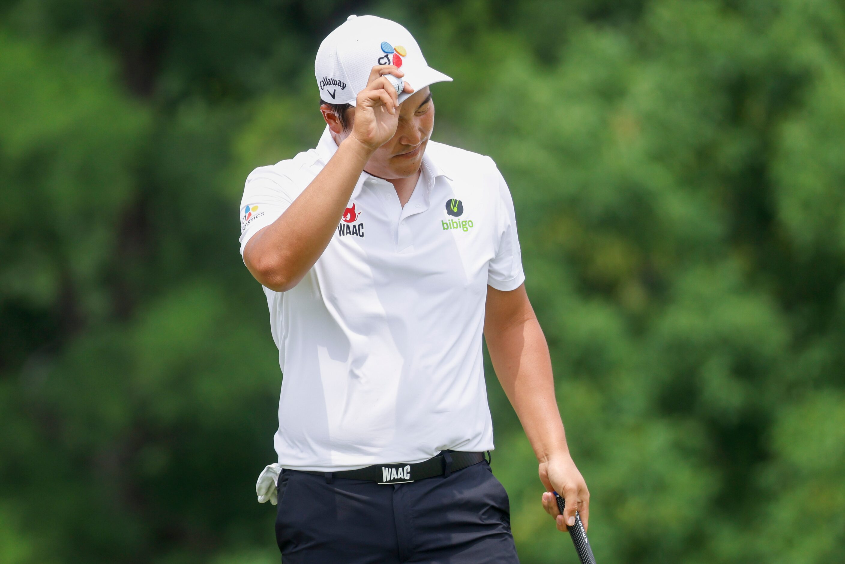 K.H. Lee reacts after missing the hole on the ninth hole during the second round of the AT&T...