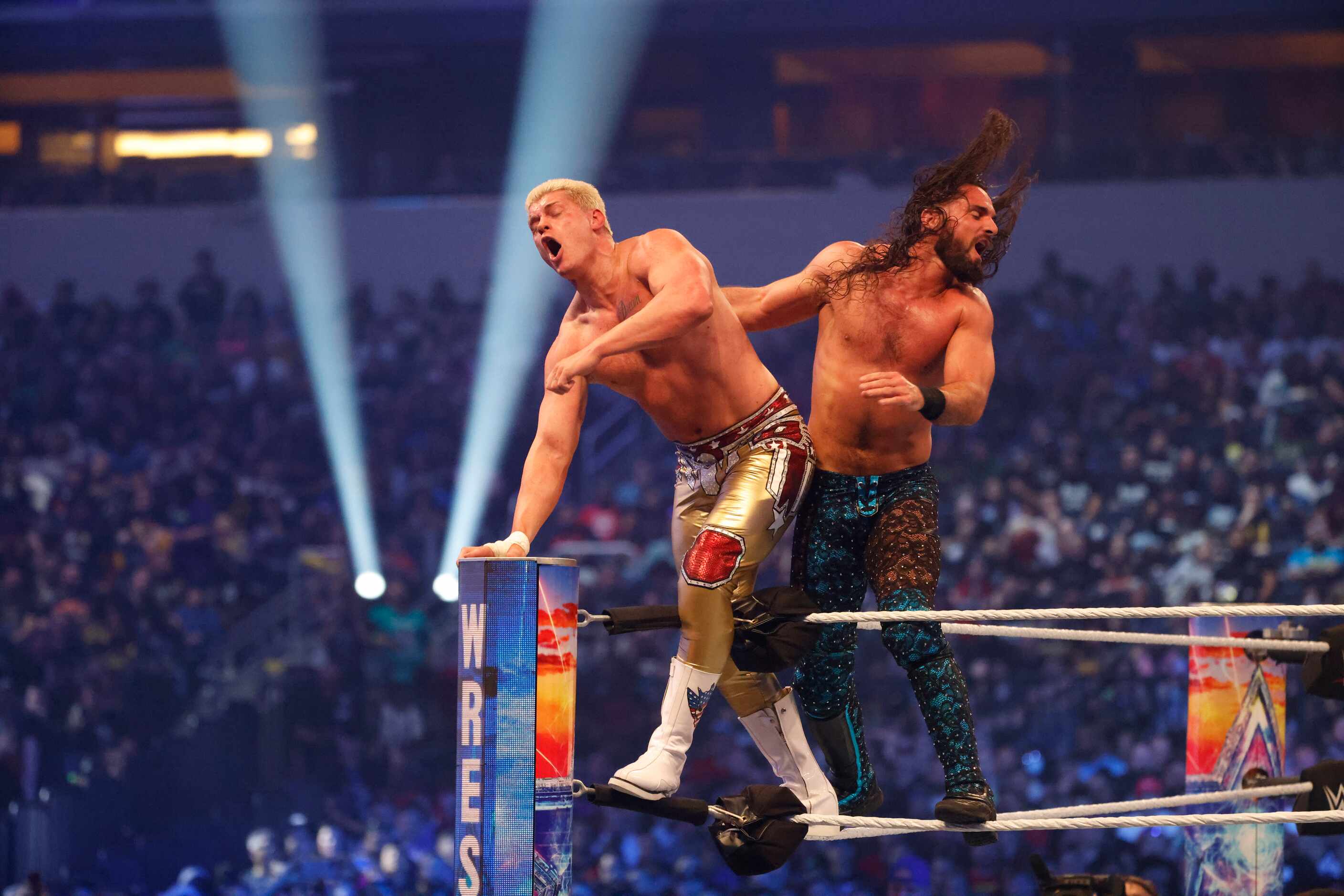 Cody Rhodes, left, and Seth Rollins wrestle during WrestleMania in Arlington, Texas on...
