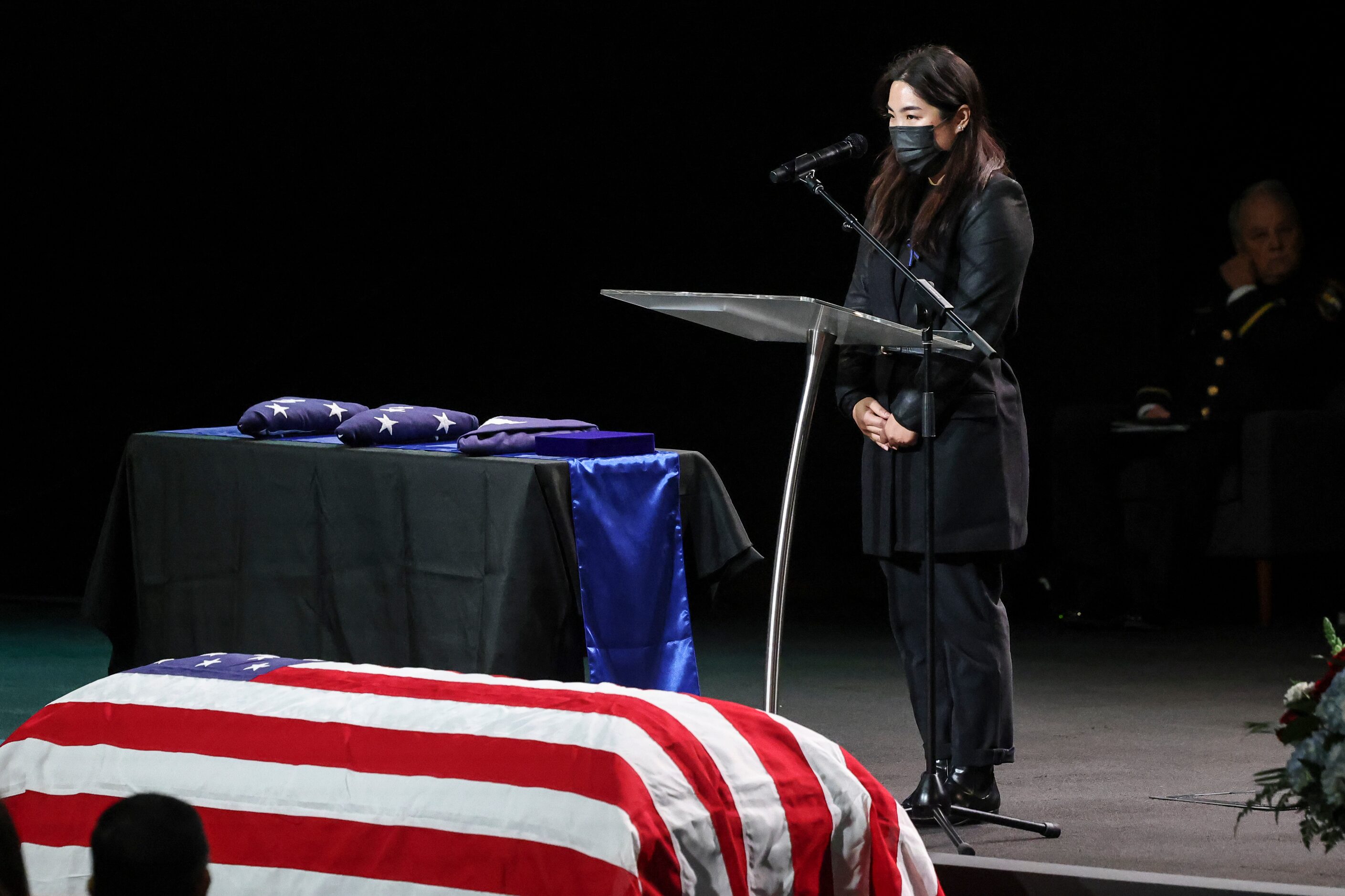 Staci Tsai, sister of Grand Prairie police officer Brandon P. Tsai speaks at his memorial...